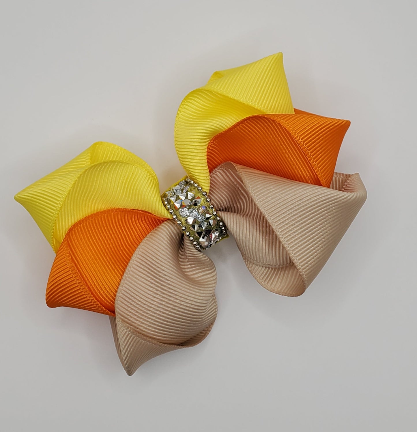 Lazo para el cabello boutique en mezcla de cintas de grogrén amarillas, naranjas y beige