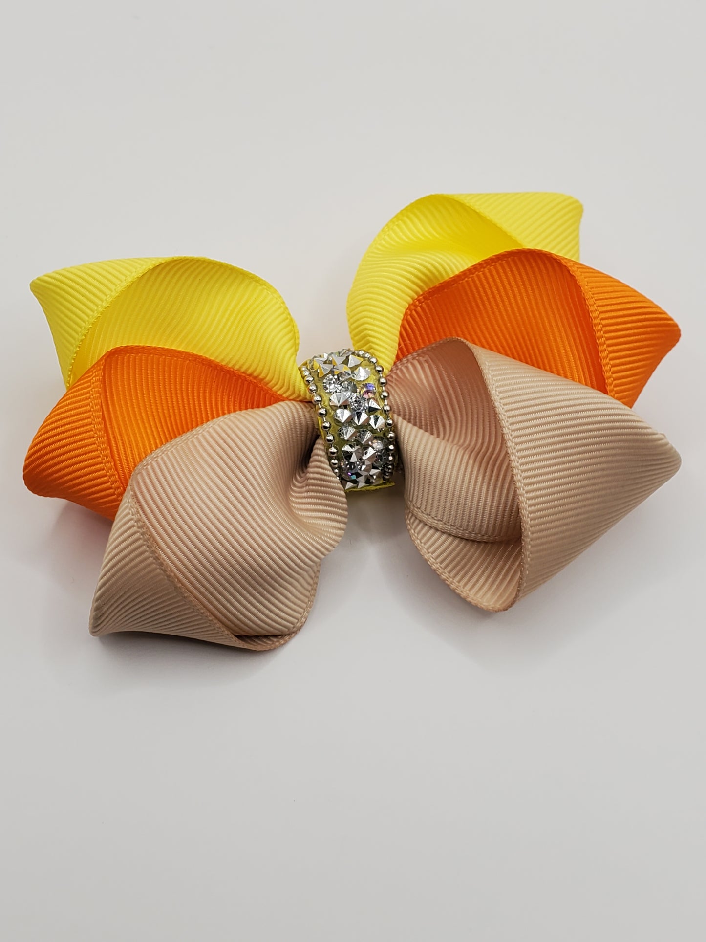 Lazo para el cabello boutique en mezcla de cintas de grogrén amarillas, naranjas y beige
